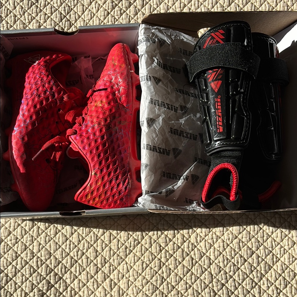 Kids Red Soccer Cleats and Shin Guards Set